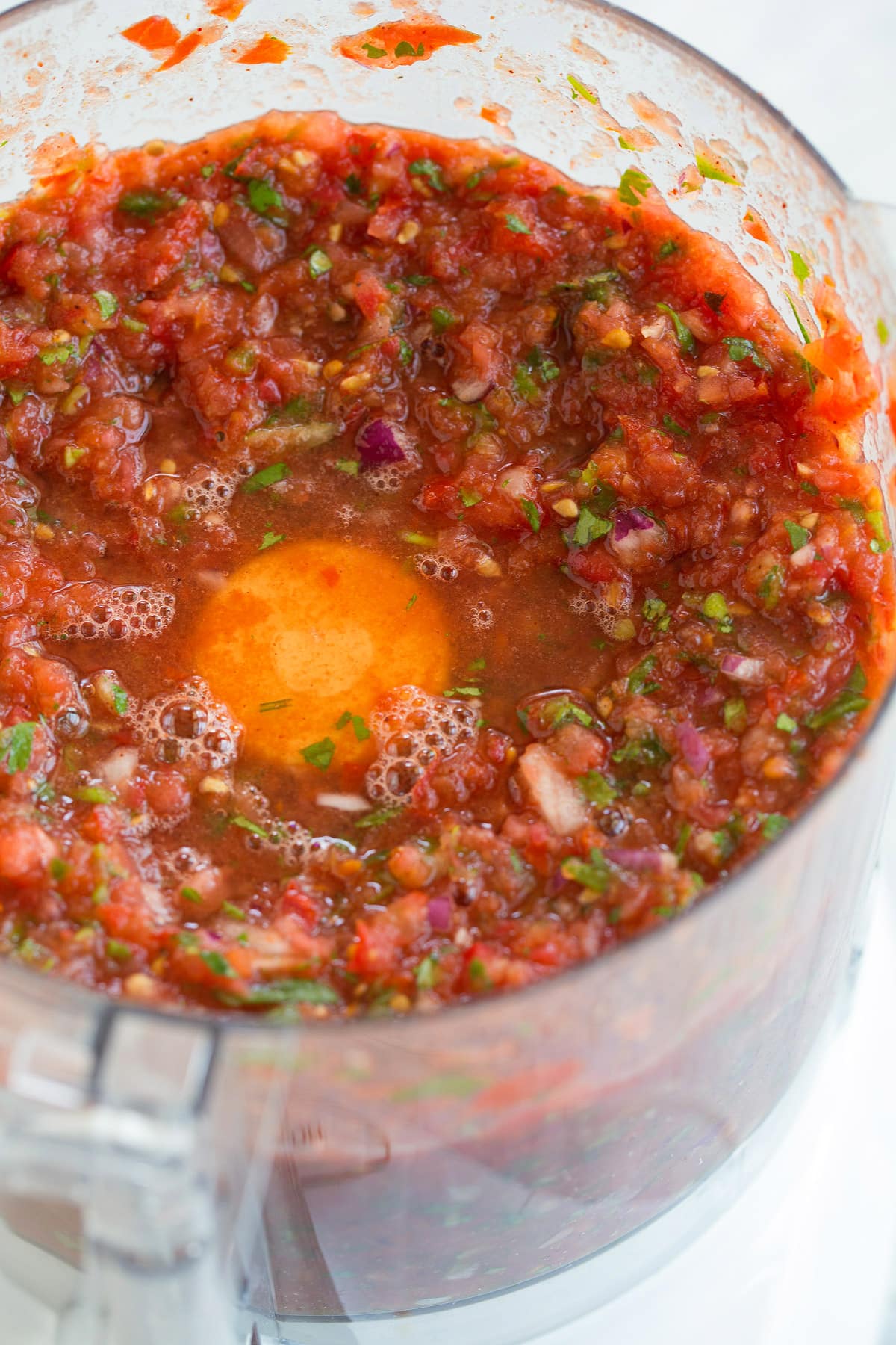 Homemade Salsa Fresh Homemade Salsa in a food processor after blending.