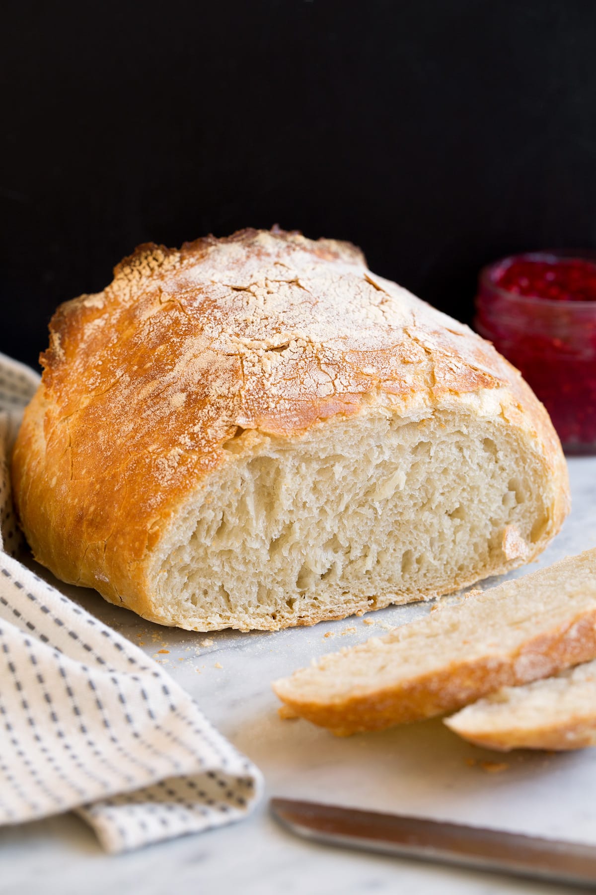 No Knead Bread No knead bread shown with a few pieces sliced of to show interior texture.