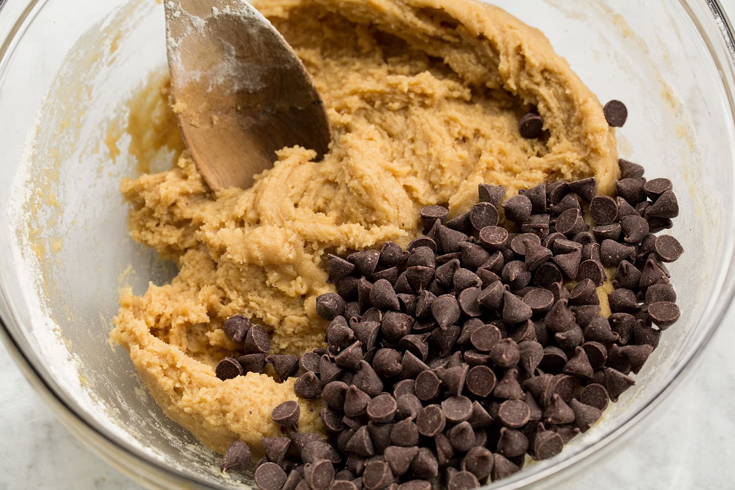 Skillet Chocolate Chip Cookie Cookie dough batter with chocolate chips added.
