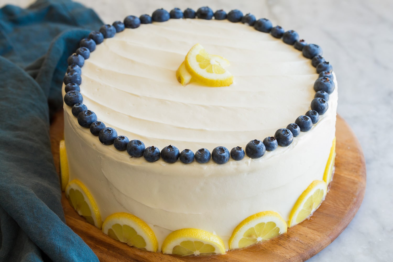 Lemon Blueberry Cake Completed layered lemon and blueberry cake.