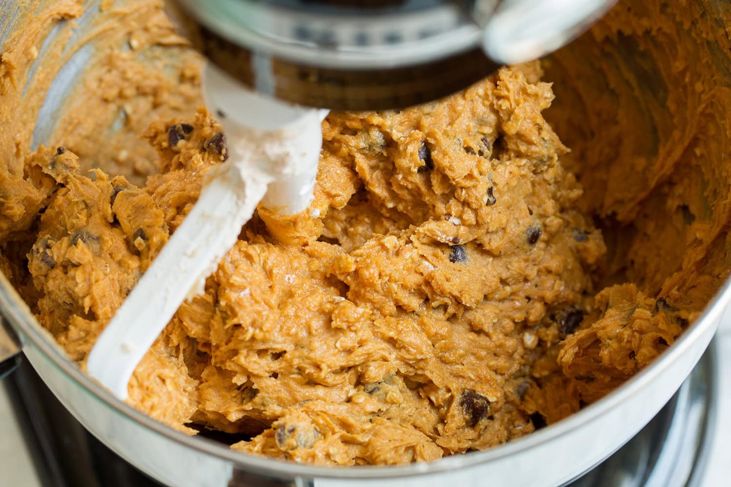 Pumpkin Oatmeal Chocolate Chip Cookies Completed pumpkin cookie dough in stand mixer.