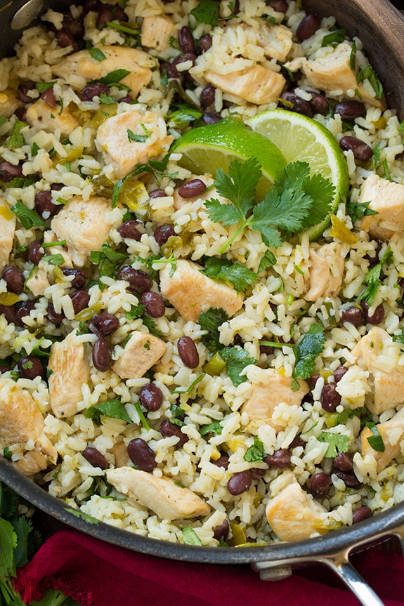 This One Pan Cilantro Lime Chicken is so easy to prepare and is packed with flavor. It's served with black beans and rice making it a filling and satisfying meal as it is but you could also go all out and add your favorite Mexican toppings. #cookingclassy #chicken #lime #onepan One Pan Cilantro Lime Chicken and Rice with Black Beans in a skillet pan