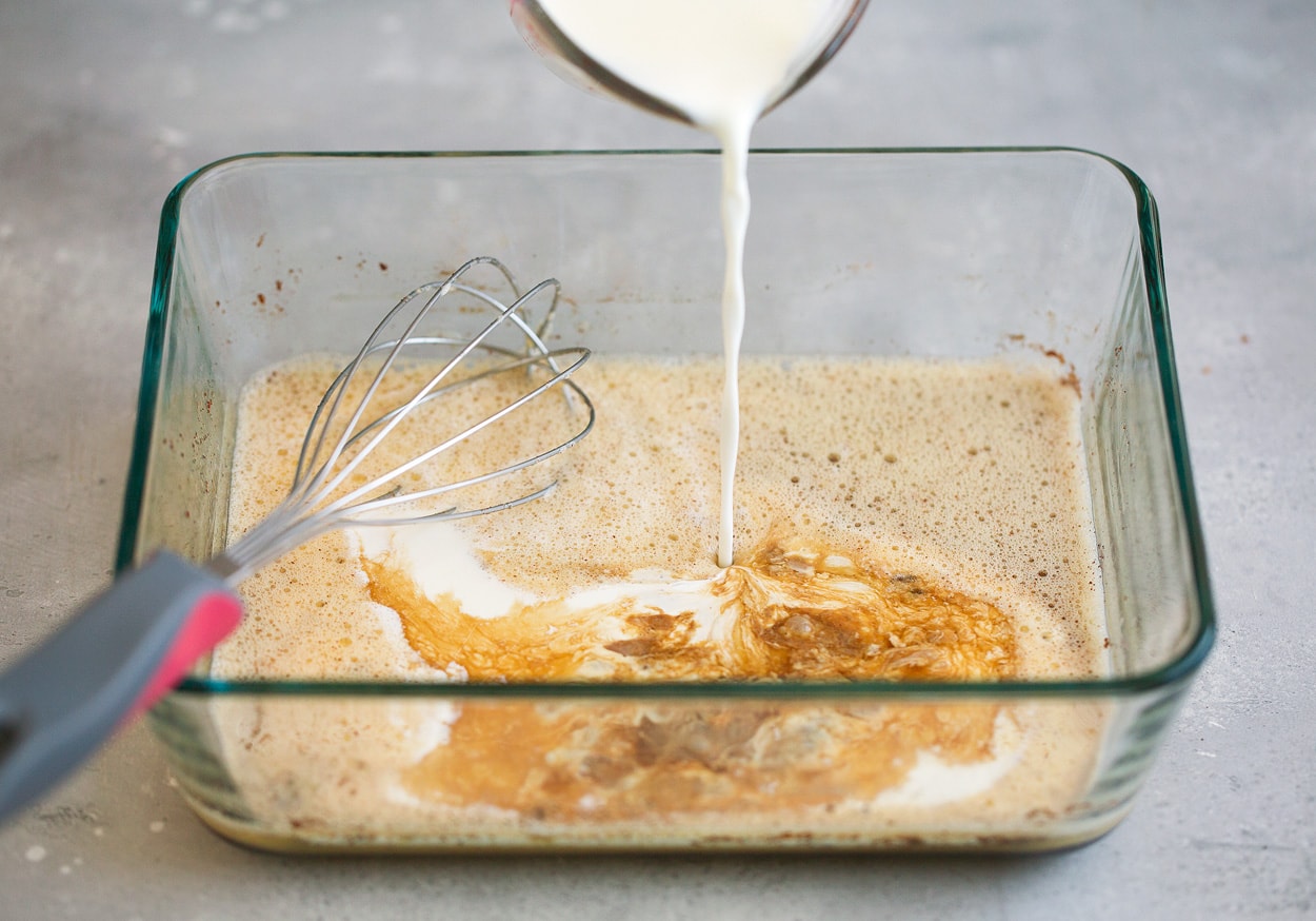 French Toast Adding milk and cream to french toast custard mixture.