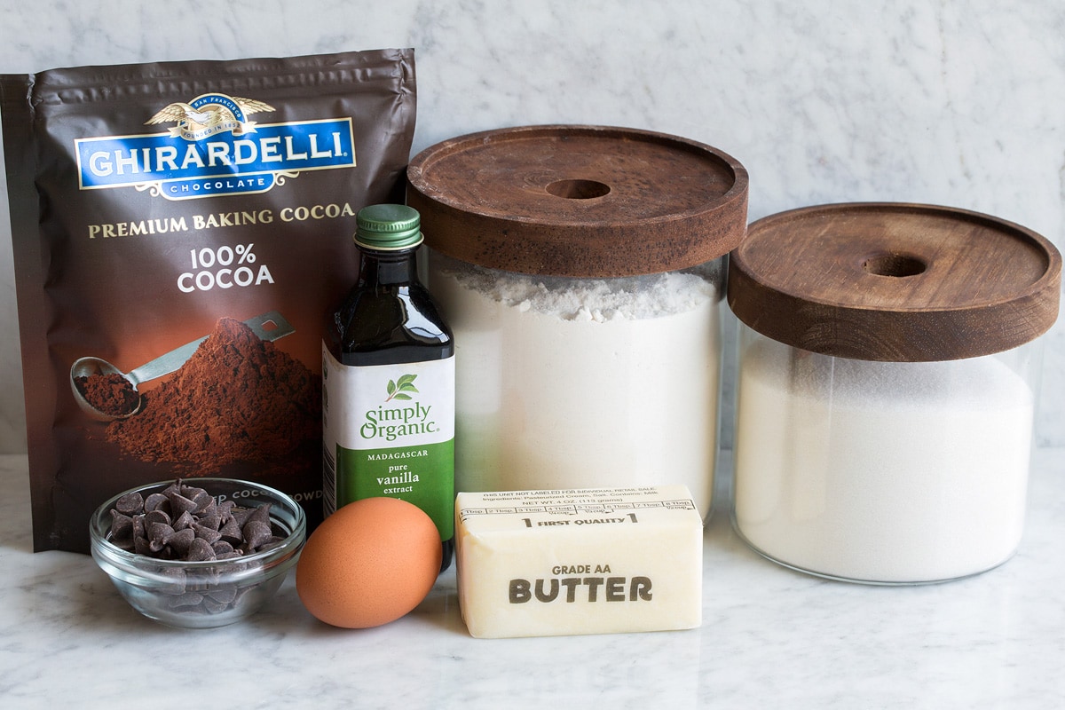 Small Batch Brownies Ingredients for small batch brownies displayed. Includes flour, sugar, butter, vanilla, egg, cocoa powder and optional chocolate chips.