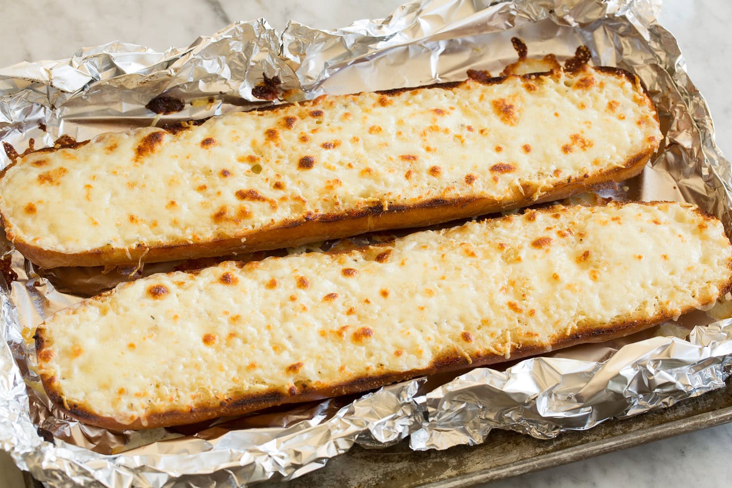 Cheesy Garlic Bread Completed cheesy french bread shown after toasting.