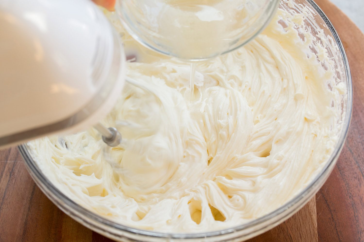No Bake Cheesecake Melted gelatin mixture added to cream cheese mixture.