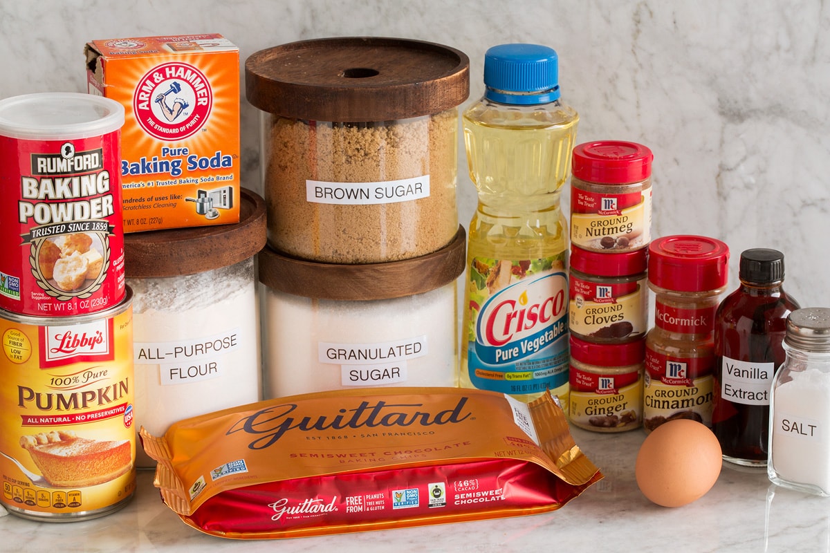 Pumpkin Chocolate Chip Cookies Image of ingredients used to make pumpkin chocolate chip cookies. Includes flour, white sugar, brown sugar, egg, spices, vanilla, chocolate chips, vanilla, baking powder, baking soda and pumpkin.