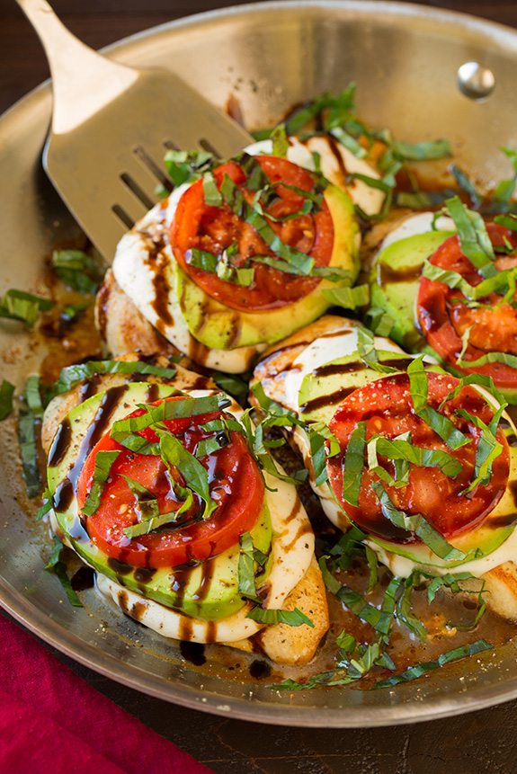 Avocado Caprese Skillet Chicken | Cooking Classy Shown here chicken breasts in a skillet are top with fresh mozzarella avocado tomato basil and balsamic glaze