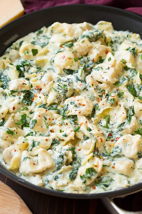 Creamy Spinach Artichoke Tortellini Creamy Spinach Artichoke Tortellini in a skillet.