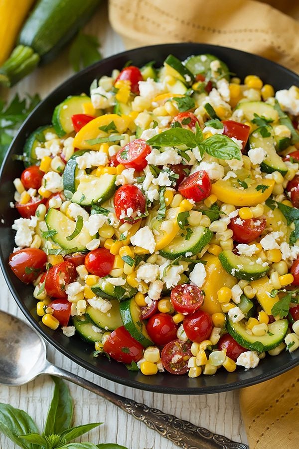 Summer Harvest Salad Salad with sauteed zucchini, squash and corn. Tossed with fresh tomatoes, feta, lemon and herbs.