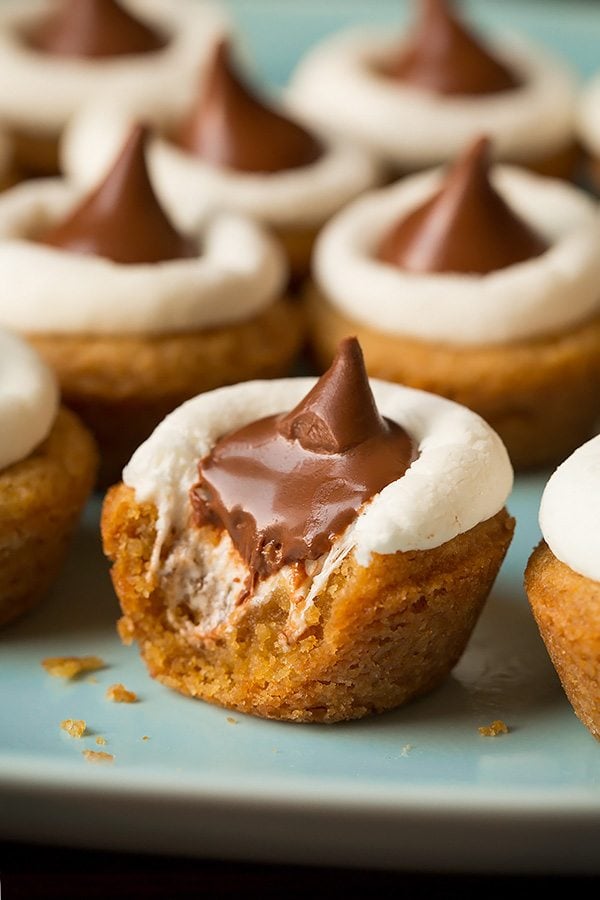 S'more cookie with a bite taken out to show gooey melted chocolate center.