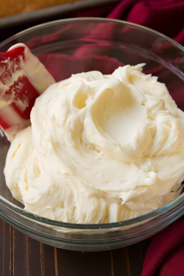 Pumpkin Sheet Cake with Cream Cheese Frosting Cream cheese frosting in a glass mixing bowl, for pumpkin cake.