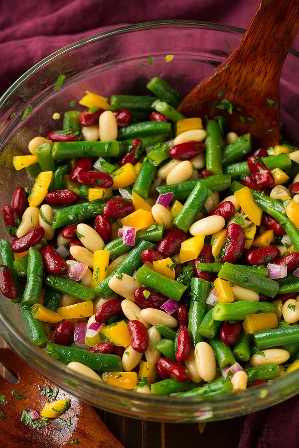 Three Bean Salad Three Bean Salad in a glass serving bowl.