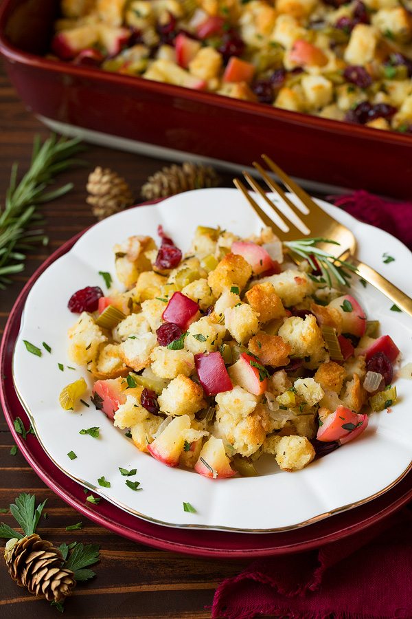 Single serving of stuffing on a white serving plate.