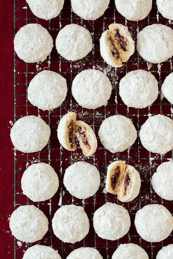 Raspberry Almond Snowball Cookies Raspberry Almond Snowball Cookies with jam center.