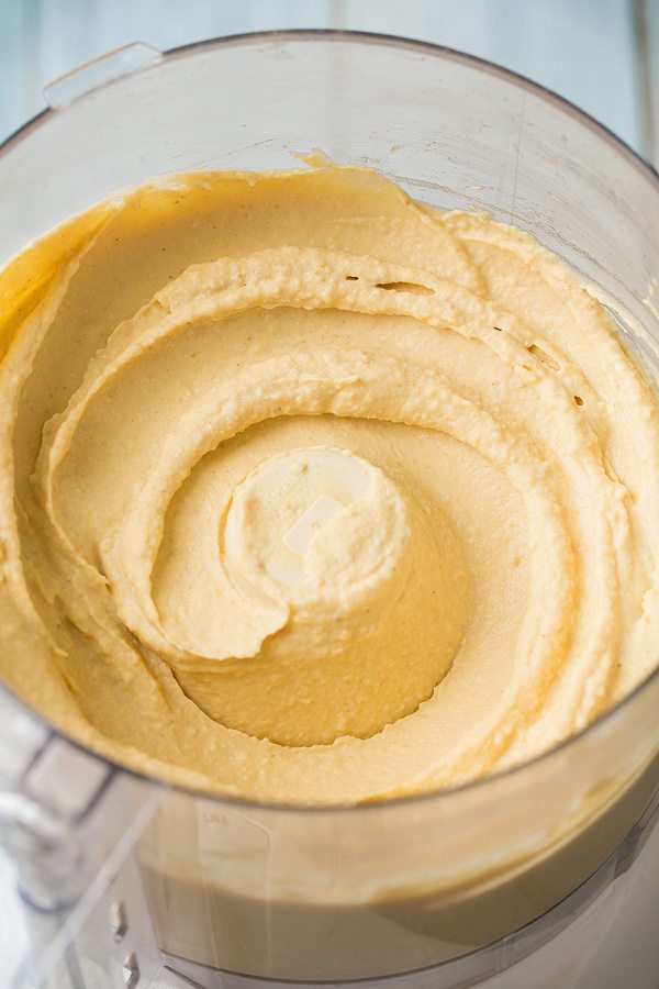 Greek Seven Layer Dip Hummus in food processor.