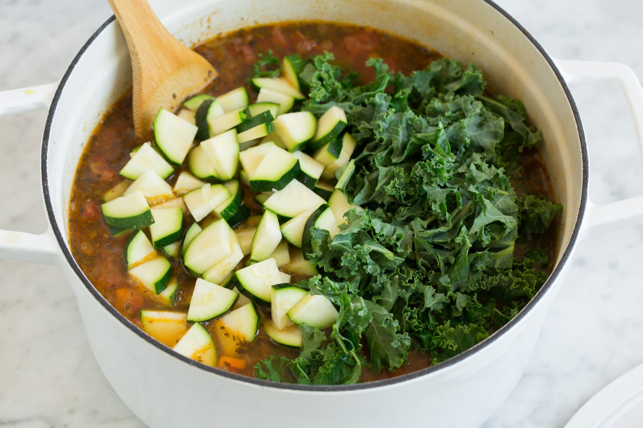 Lentil Soup zucchini and kale in a pot of lentil soup