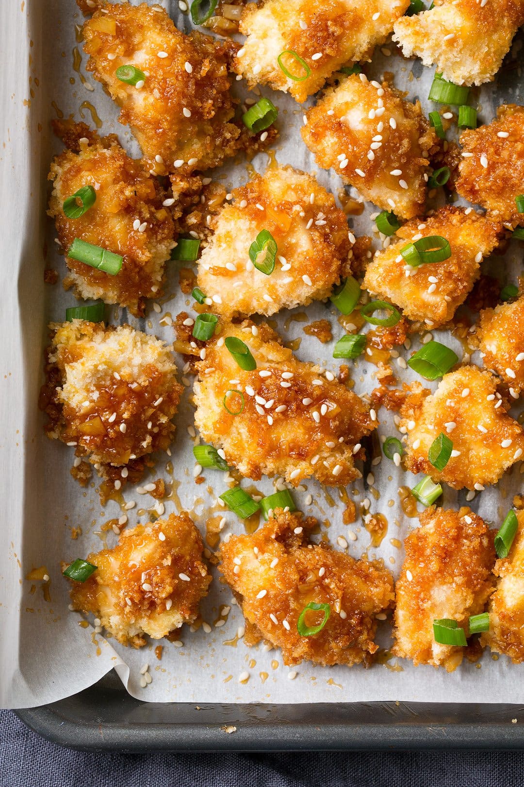 Honey Garlic Chicken Close up image of honey garlic chicken to show texture of panko and sticky sauce.