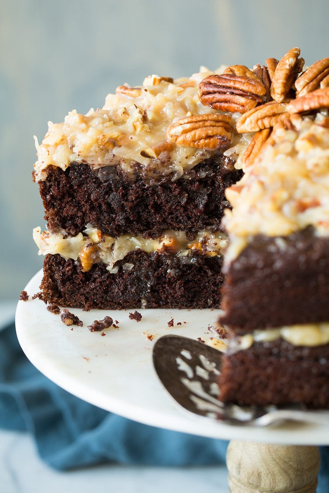 German Chocolate Cake German Chocolate Cake with slice take out. Shown from a side angle.