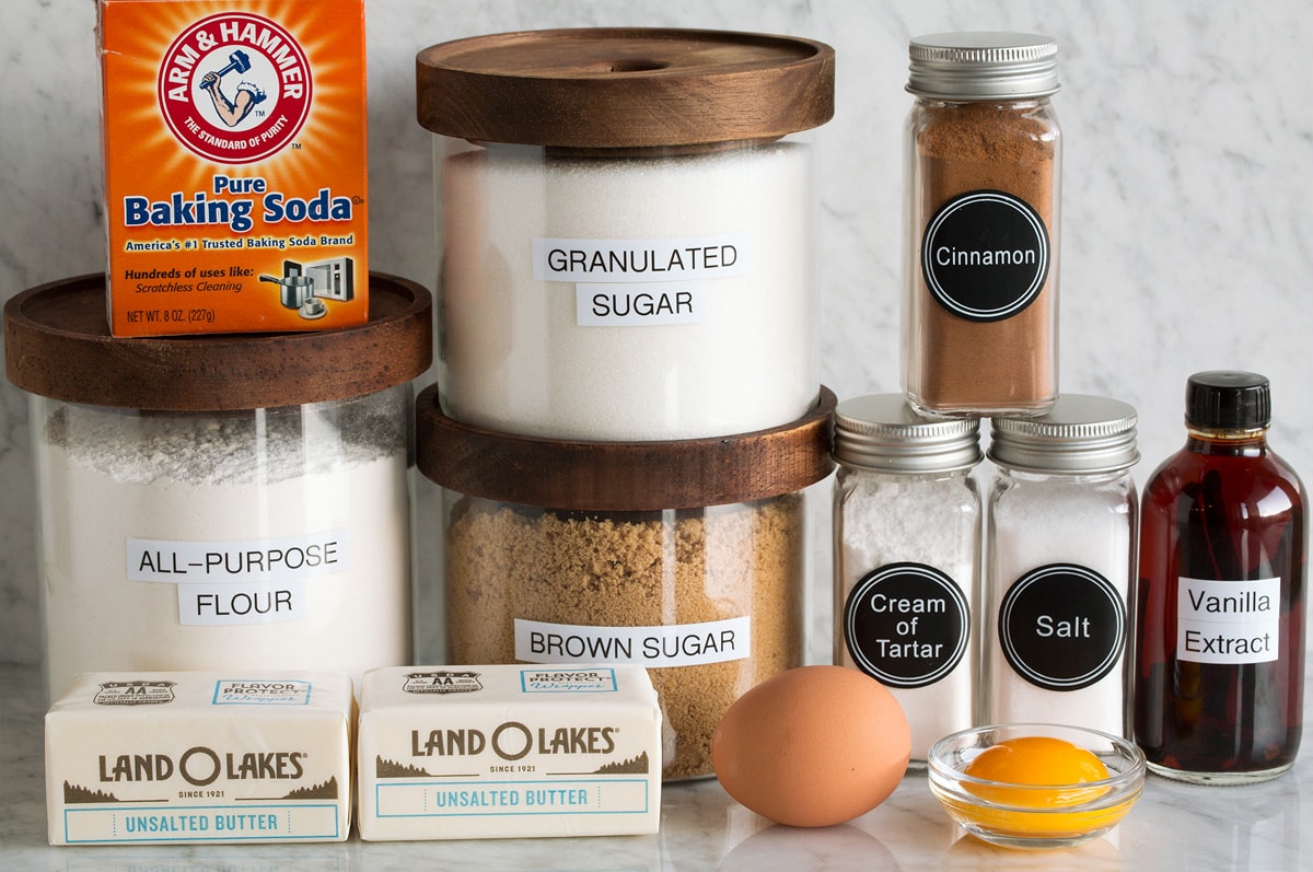 Snickerdoodle Cookies Image of ingredients used to make Snickerdoodle cookies. Includes flour, granulated sugar, brown sugar, egg, egg yolk, butter, salt, cream of tartar, cinnamon, vanilla and baking soda.