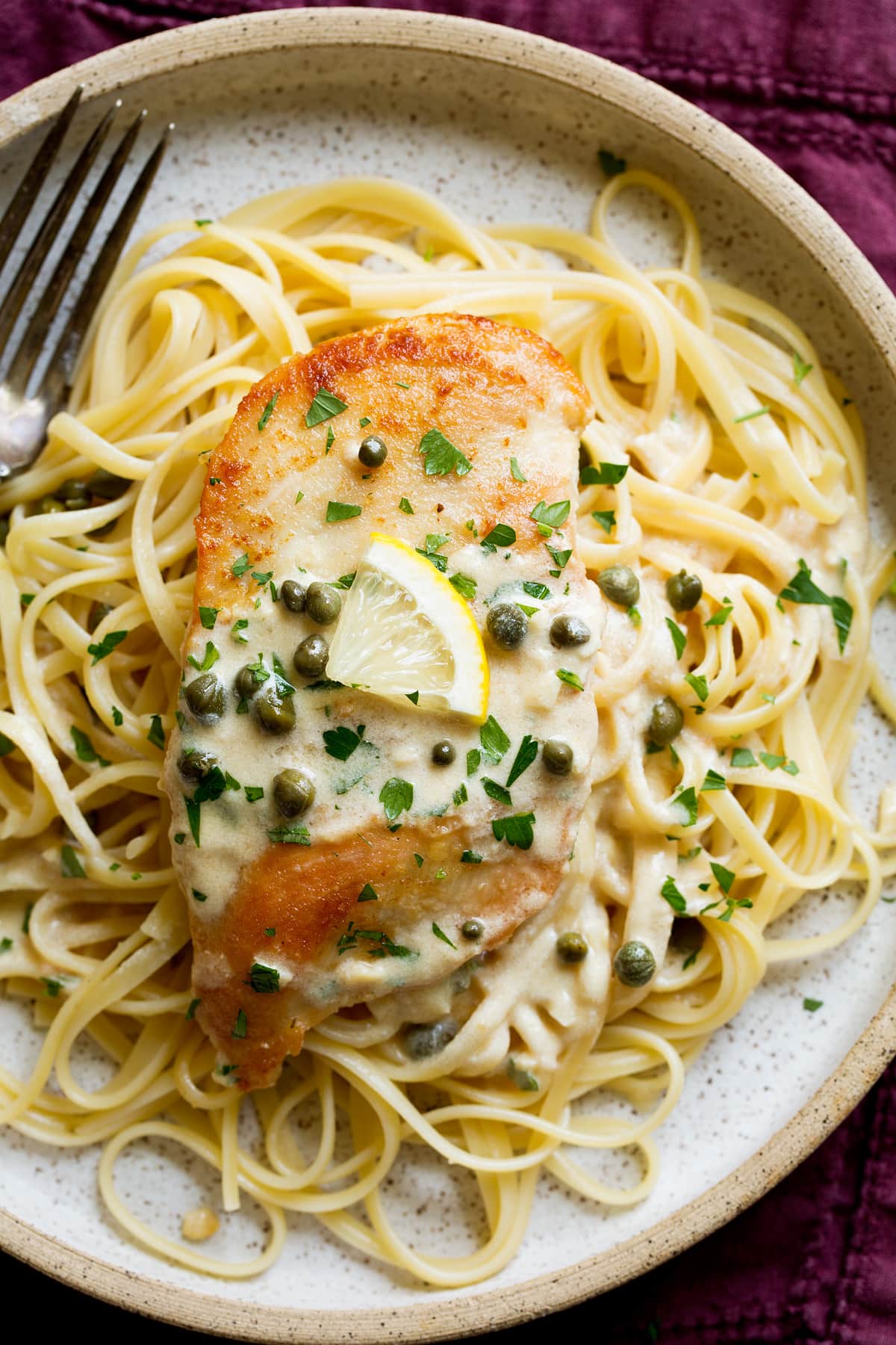 Chicken Piccata Chicken piccata served over fettucine pasta.