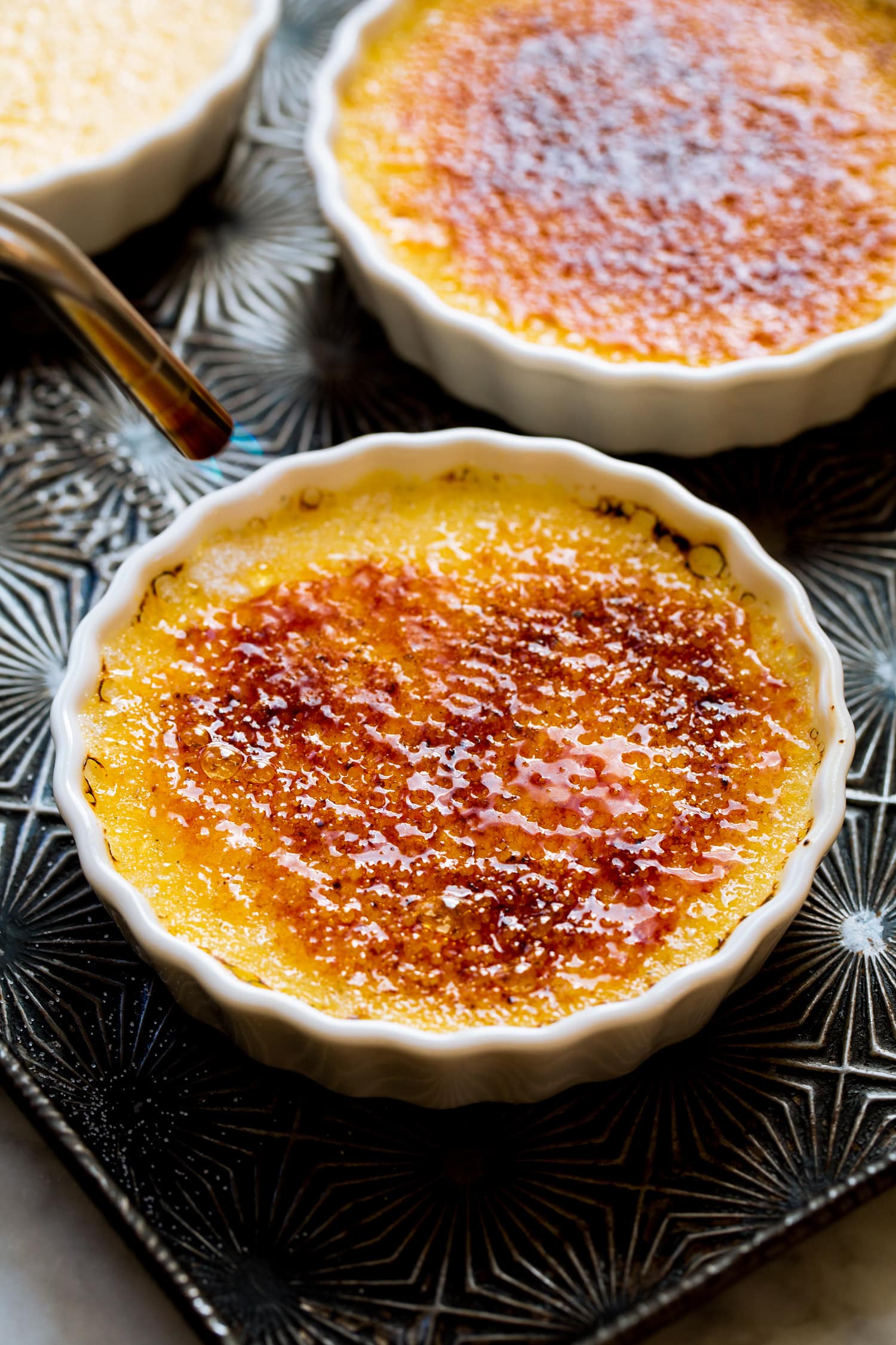 Creme Brûlée Creme brûlée sugar being caramelized with a torch.
