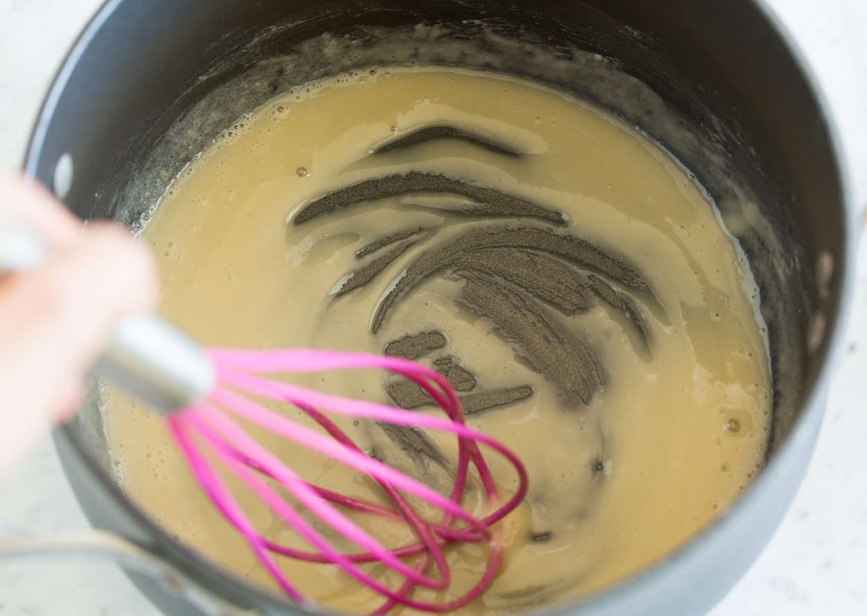 Mac and Cheese making roux in saucepan with butter and flour