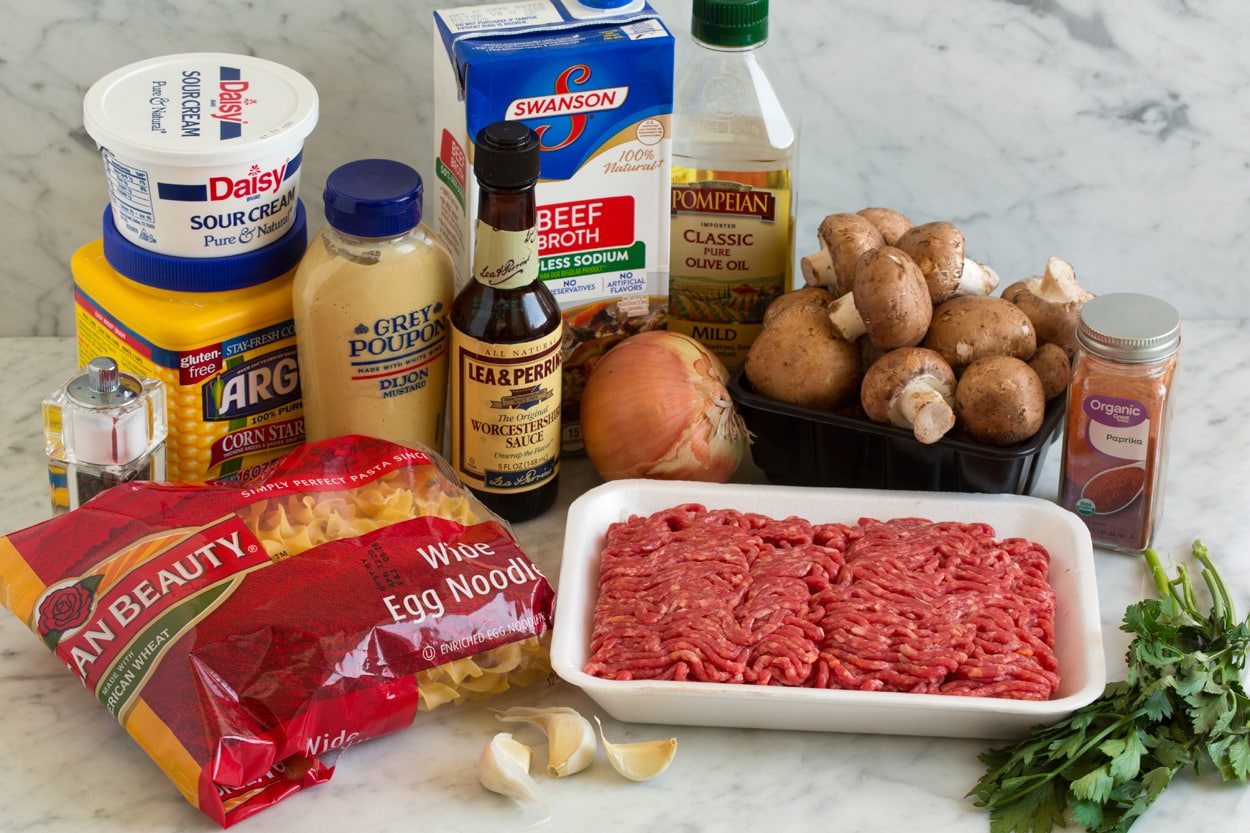Beef Stroganoff Beef Stroganoff ingredients shown here. Olive oil, mushrooms, yellow onion, garlic, lean ground beef, paprika, beef broth, dijon mustard, Worcestershire, dry egg noodles, cornstarch, sour cream
