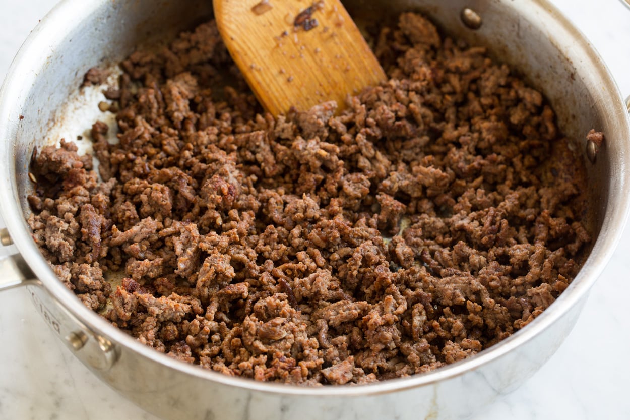 Beef Stroganoff Cooked ground beef pictured here in saute pan.