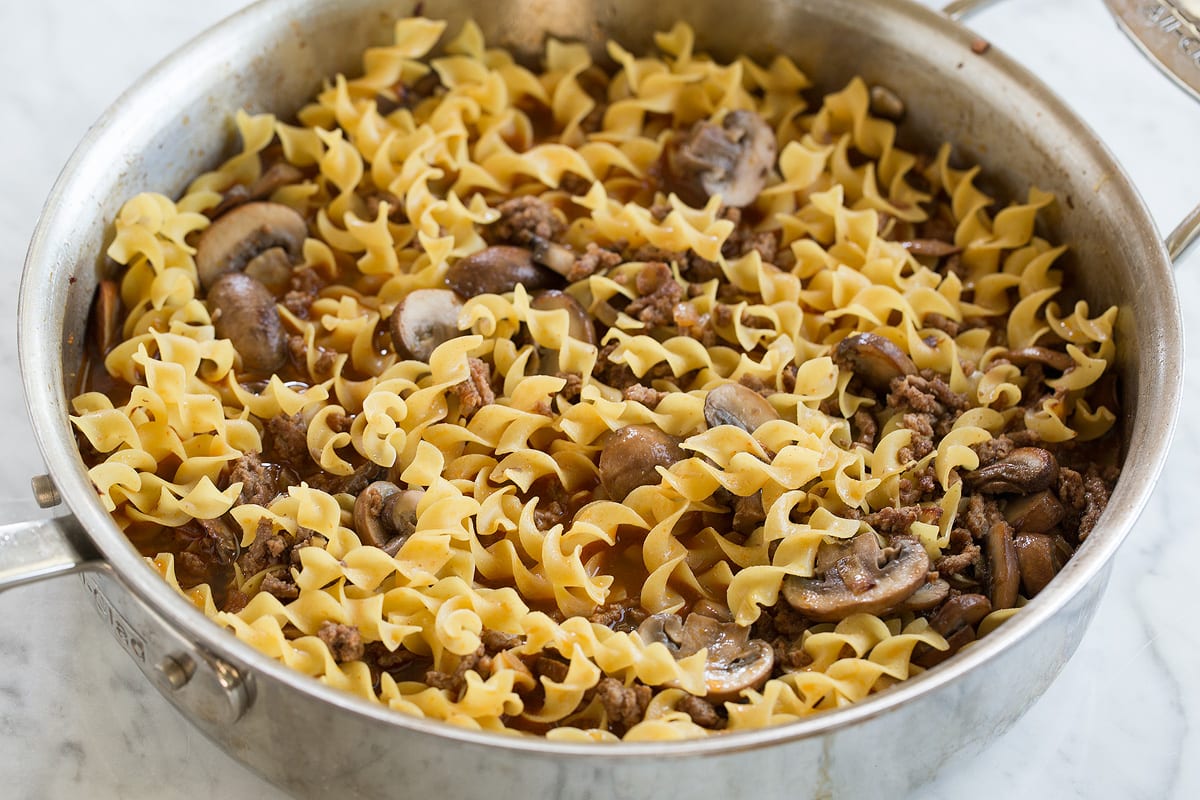 Beef Stroganoff Adding chicken broth to saute pan for beef stroganoff
