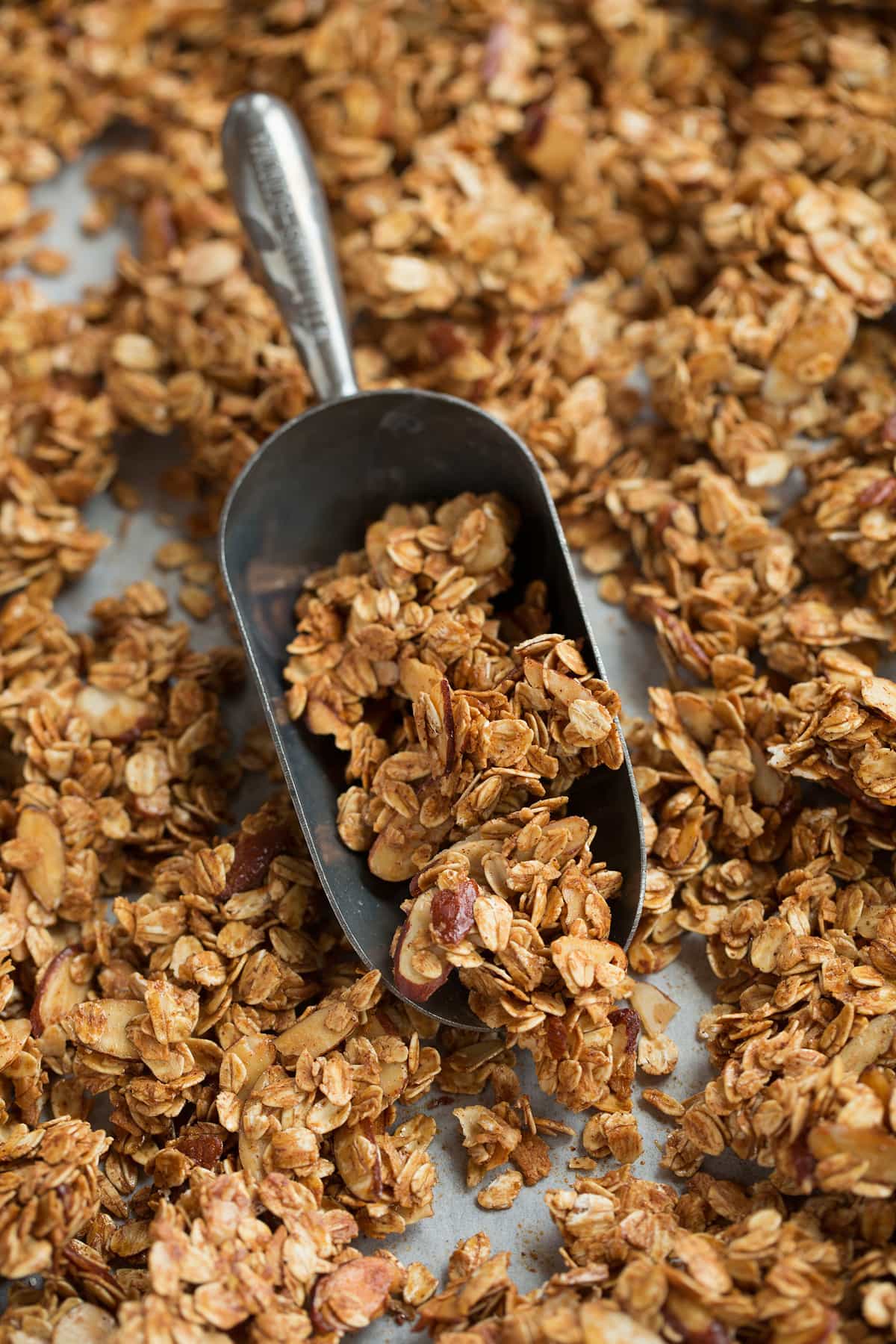 Homemade Granola Recipe Granola shown in a scoop.