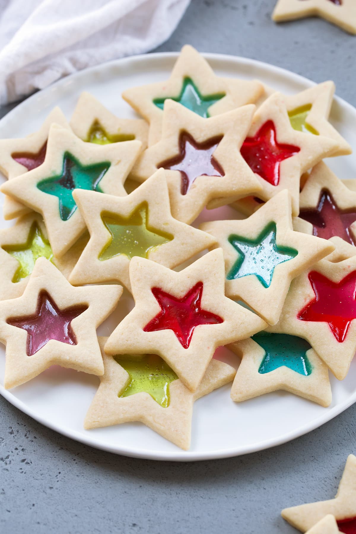 Stained Glass Cookies Stained Glass Cookies on a white serving plate.