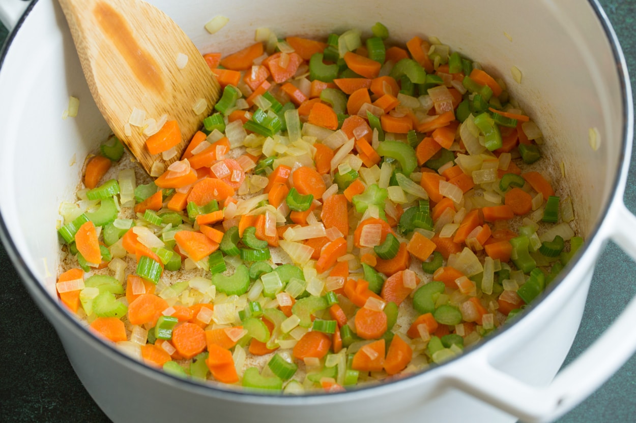 Cauliflower Soup Showing how to make Cauliflower Soup. Sautéing carrots, celery, onions and garlic in pot.
