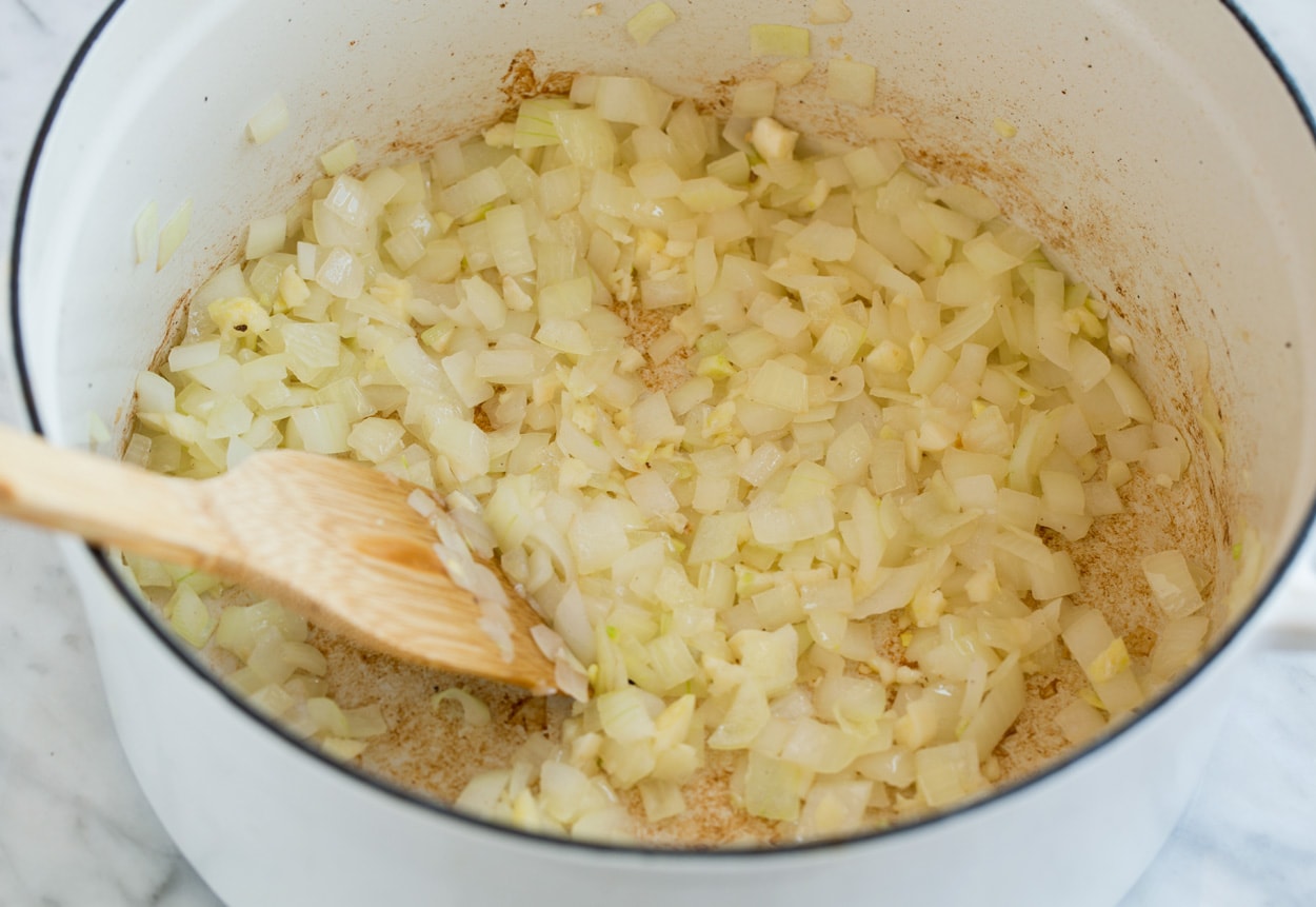 Lasagna Soup Sauteing onion and garlic for lasagna soup.