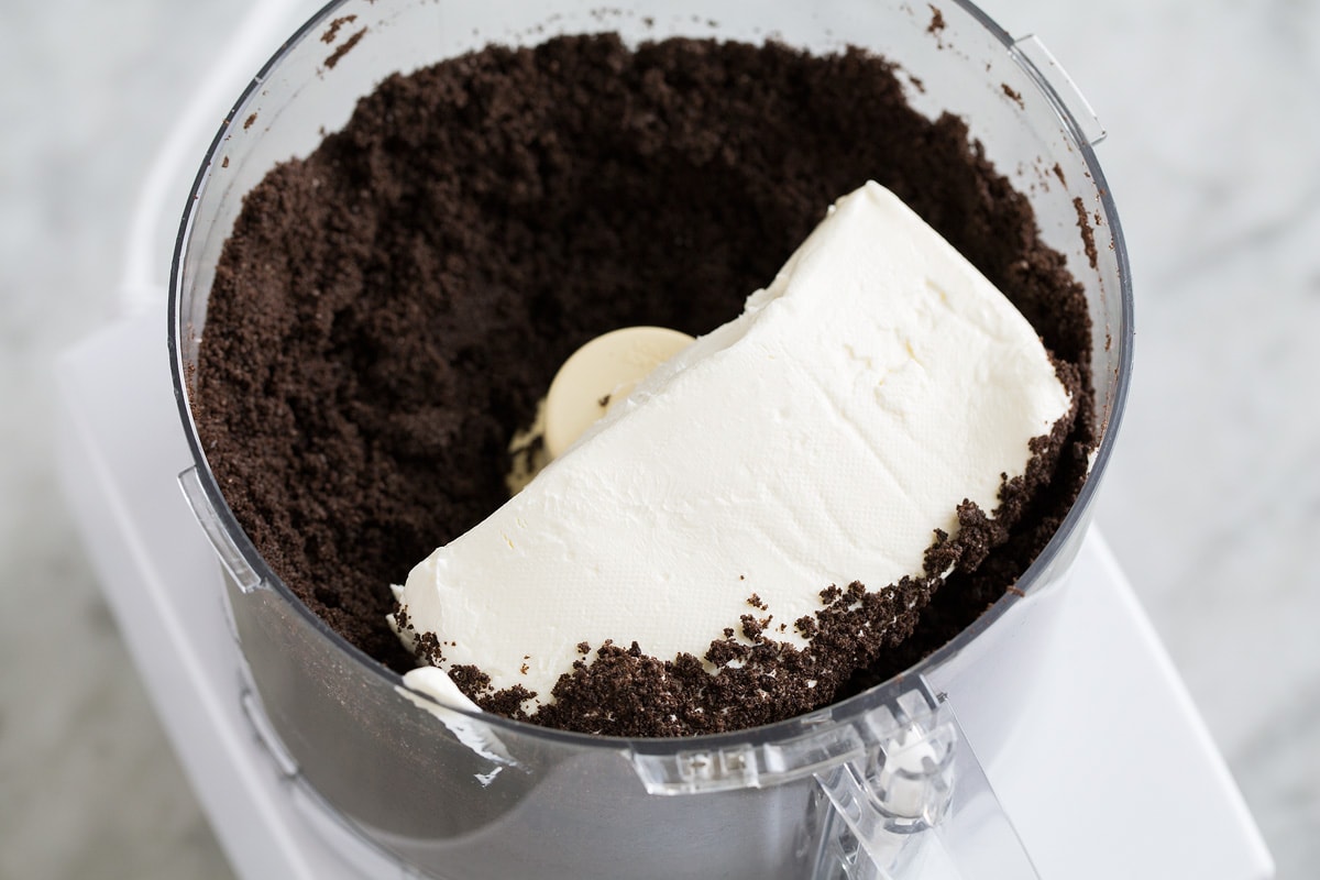 Oreo Balls Oreo Truffles Cream cheese added to crushed oreos in a food processor.