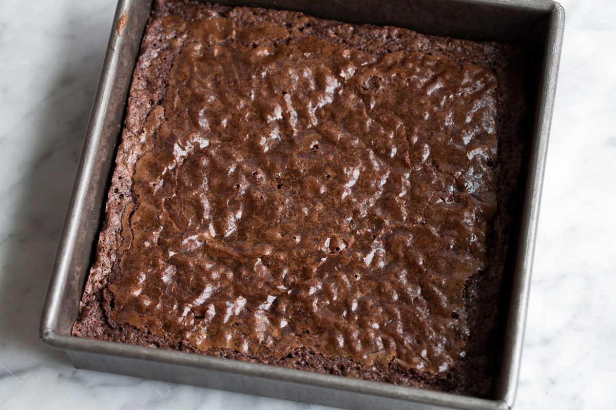 Best Cocoa Brownies Brownies being baked in baking dish.