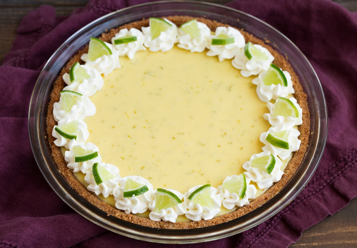 BEST EVER Key Lime Pie recipe! Whole key lime pie after baking, chilling and decorating.
