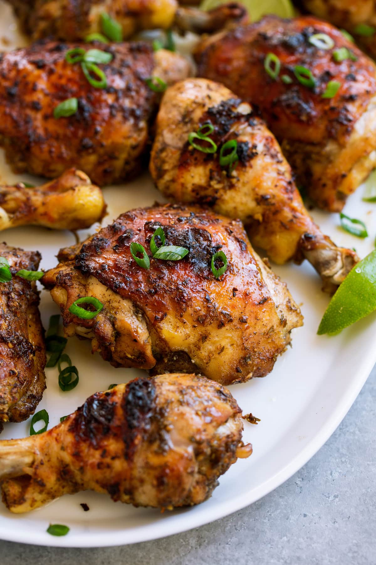 Jerk Chicken (Baked or Grilled) Jerk chicken pieces on a serving platter.