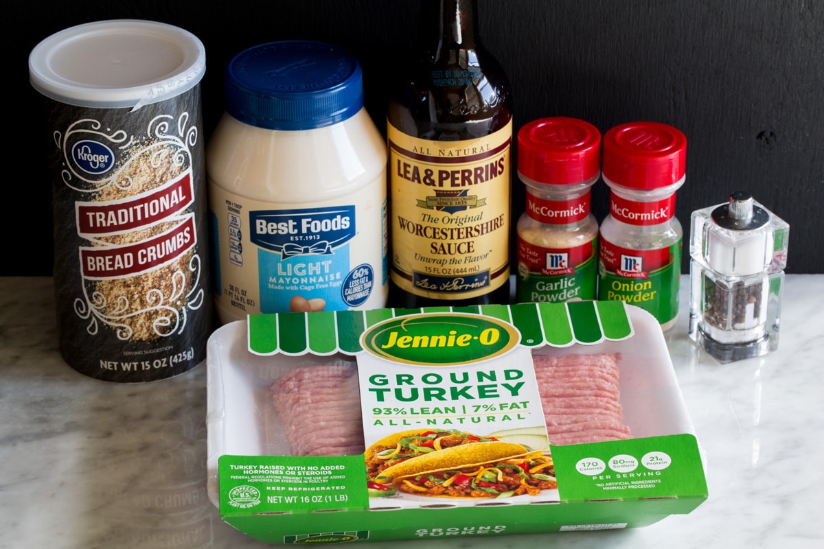 Turkey Burgers Ingredients needed to make turkey burgers shown here, including ground turkey, bread crumbs, light mayonnaise, Worcestershire, garlic powder onion powder, salt and pepper.