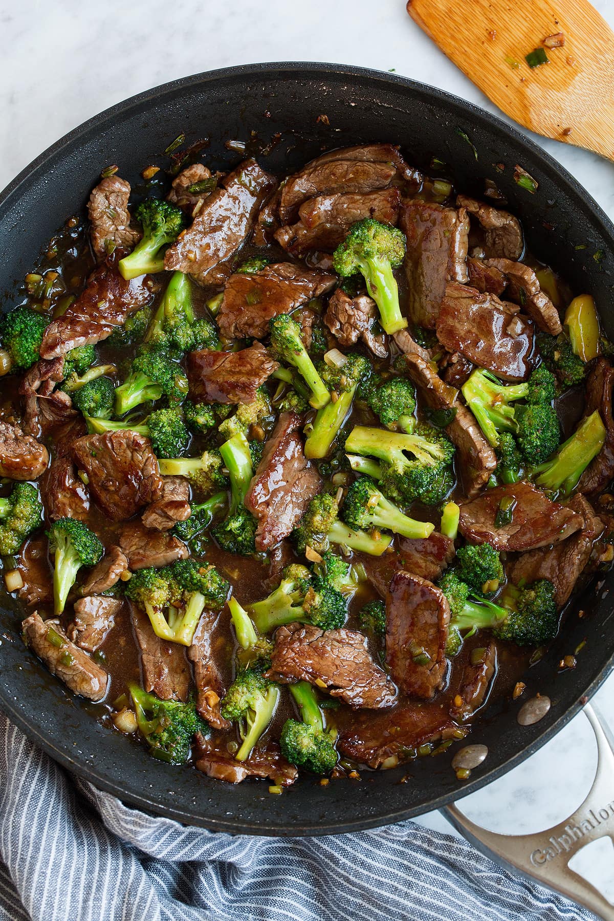 Beef and Broccoli - this is a staple dinner recipe! Easy, flavorful and sure to satisfy! #beef #broccoli #chinese #recipe Finished beef and broccoli with sauce in a skillet.