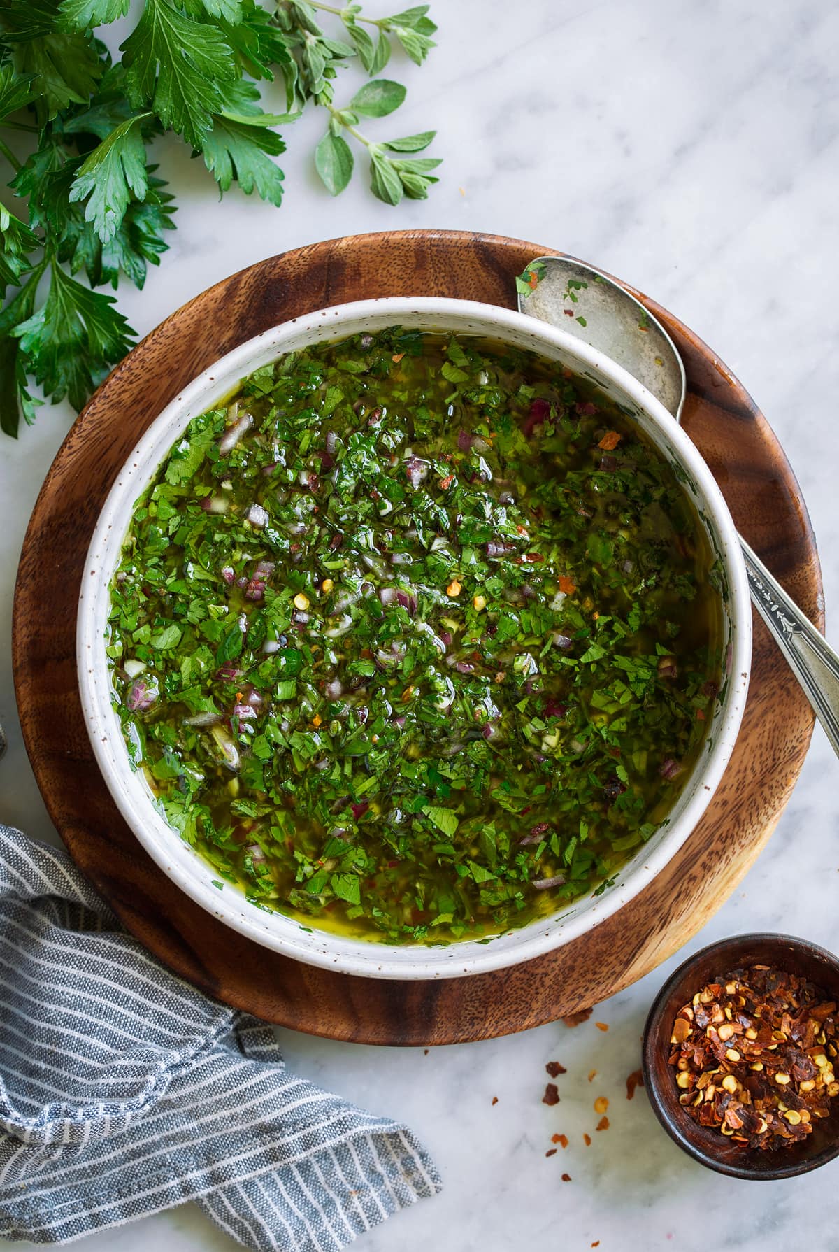 Best Chimichurri Sauce Overhead image of chimichurri in a bowl.