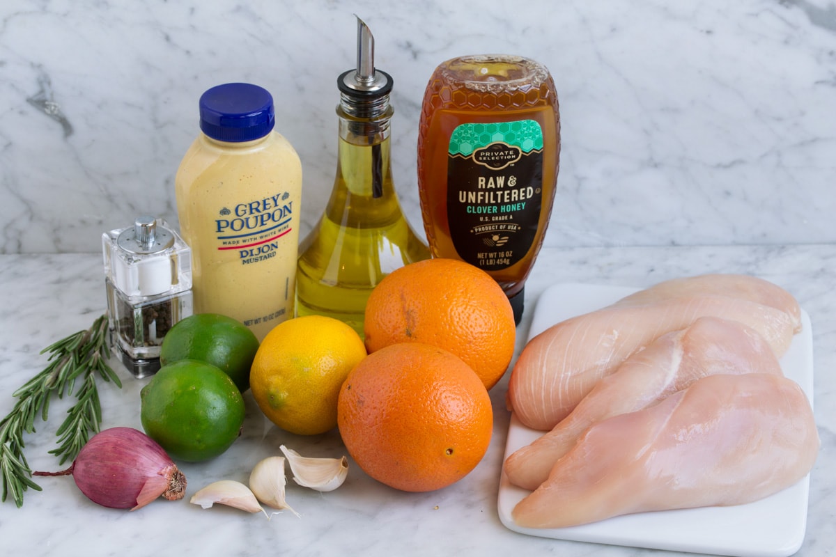 Triple Citrus Chicken Marinade - perfectly bright and refreshing! Total upgrade to plan chicken breasts or thighs. Such a delicious summer recipe! #chicken #marinade #recipe #dinner #grilled Chicken marinade ingredients.