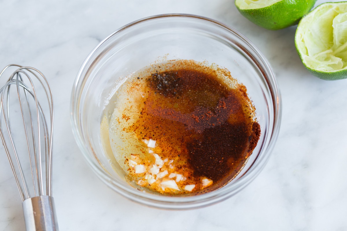Fish Tacos - these are unbelievably delicious! Easy to make too! Includes directions for oven or grill - you'll love both, just don't omit the sauce! #fishtacos #tacos #fish #recipe Making marinade for fish tacos.