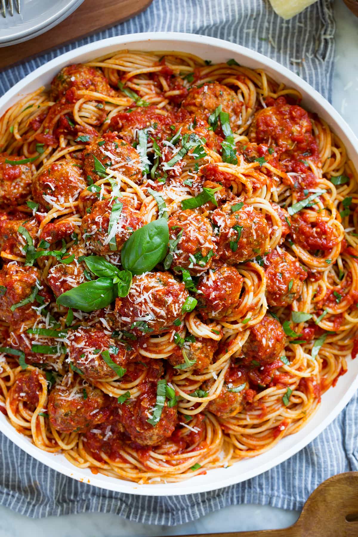 Serving platter with tall stack of homemade spaghetti and meatballs. Serving platter with tall stack of homemade spaghetti and meatballs.