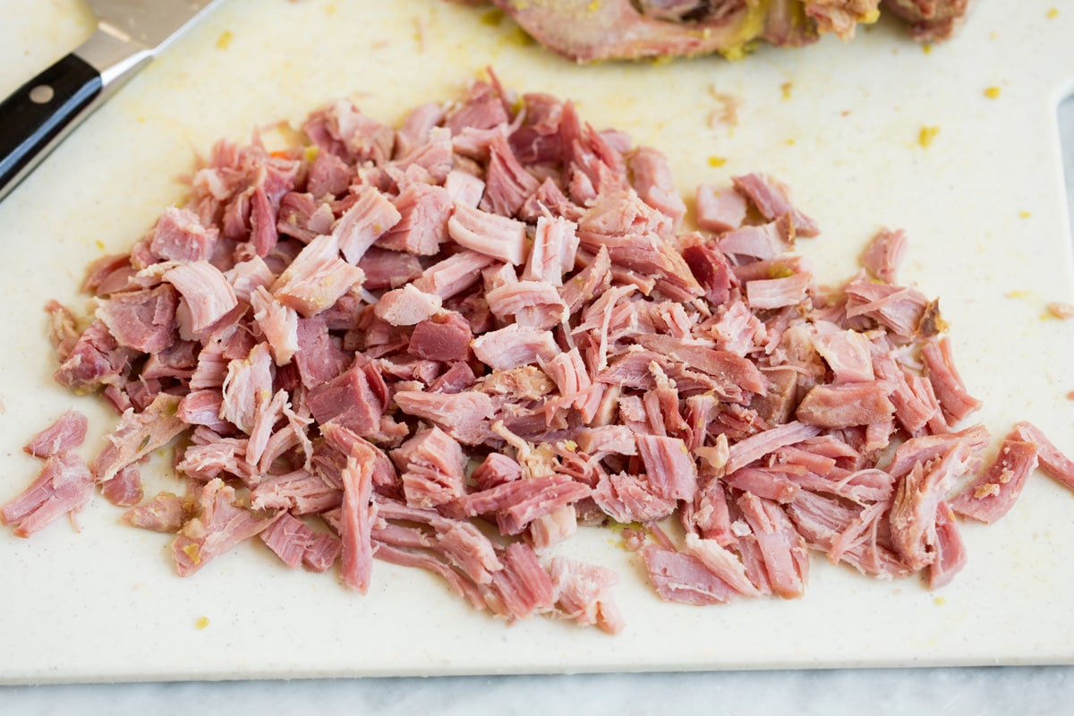 Split pea soup shredded ham on a cutting board