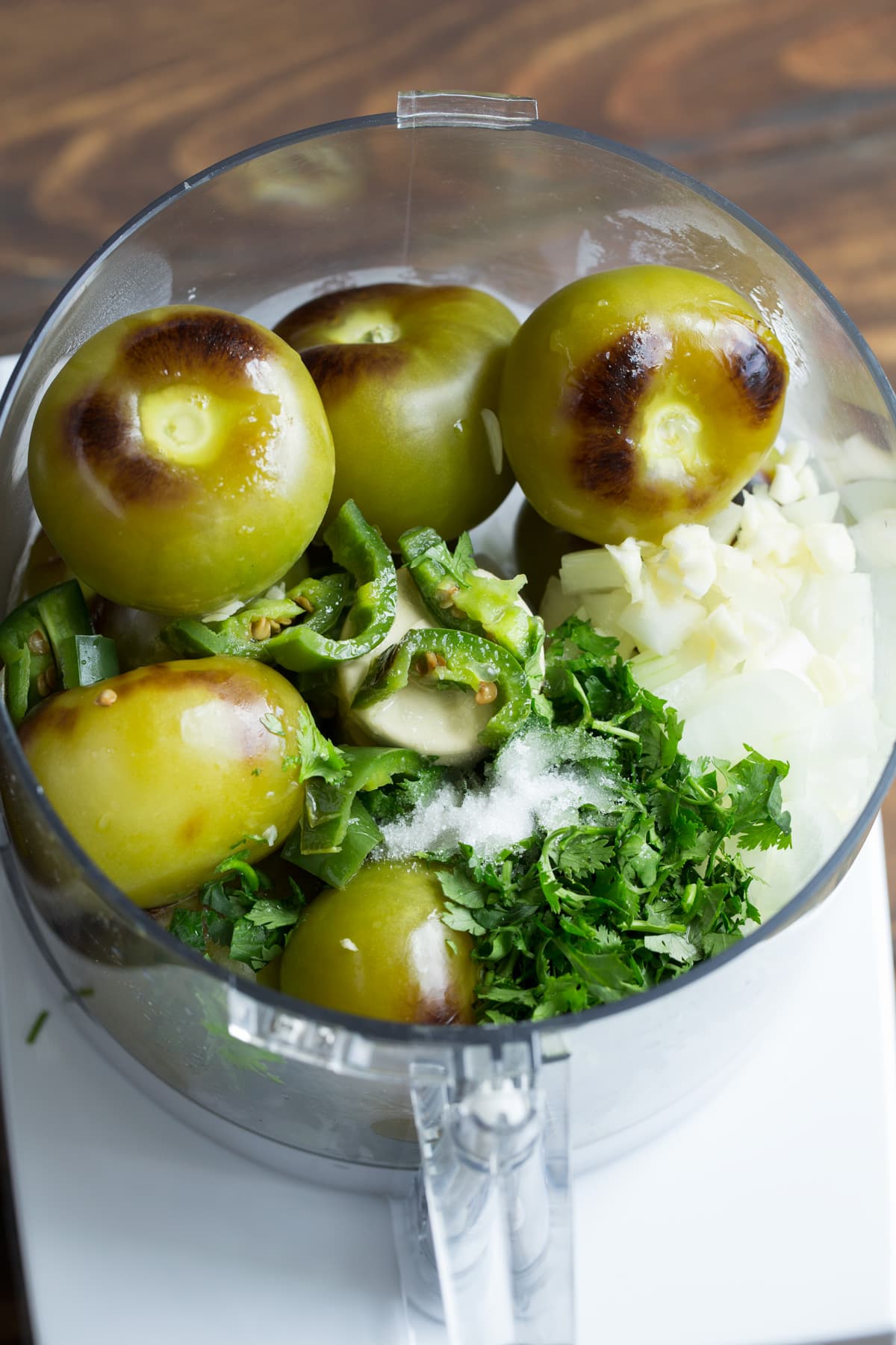 Salsa Verde Roasted tomatillos, jalapeno, onion, garlic and cilantro in a food processor.