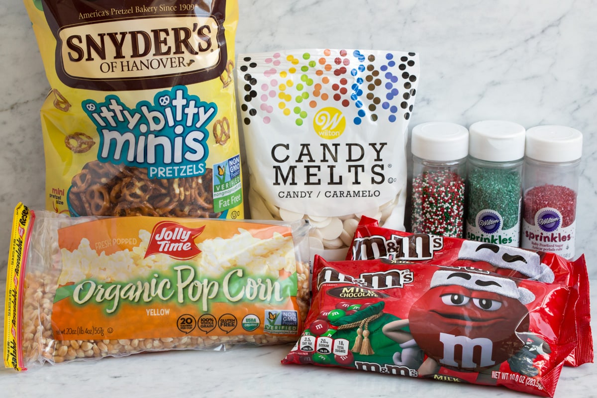 Christmas Crunch Ingredients to make easy christmas crunch popcorn treat.