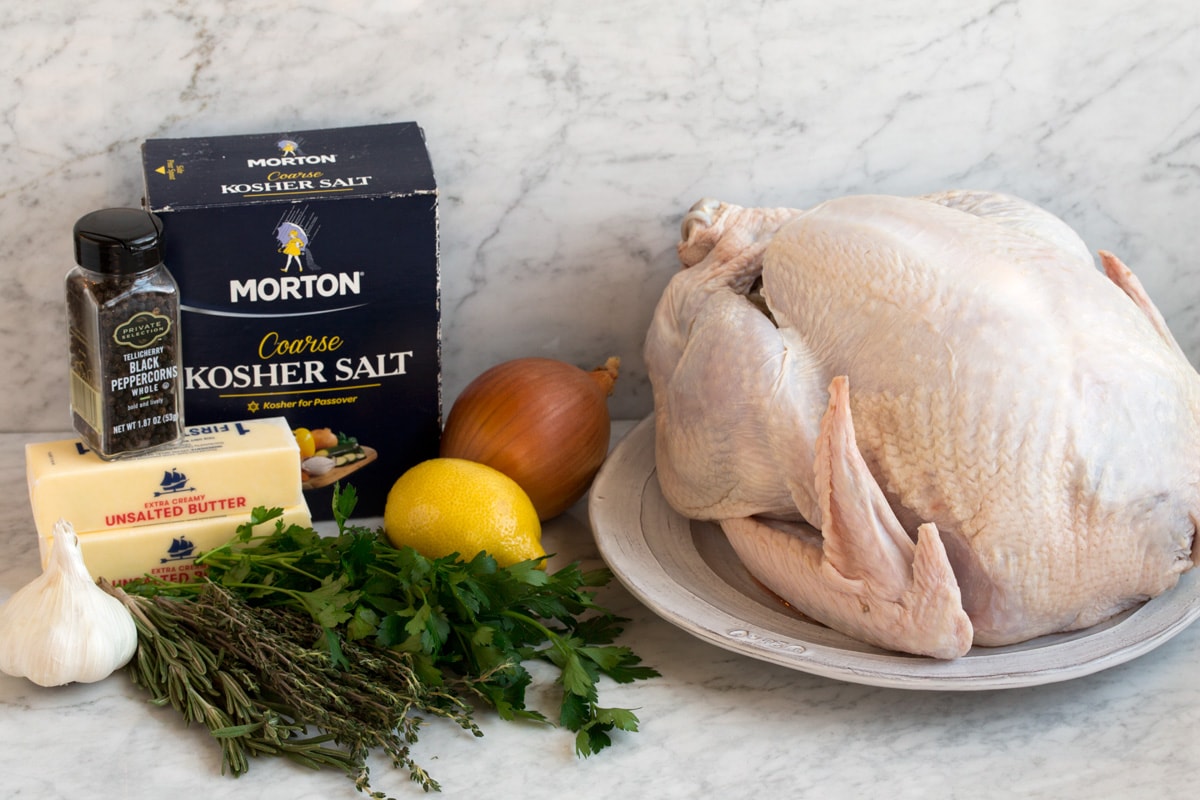 Roast Turkey - easy to follow recipe that turns out tender, juicy and full of flavor! A holiday staple! #turkey #thanksigiving Ingredients needed to make a thanksgiving turkey.
