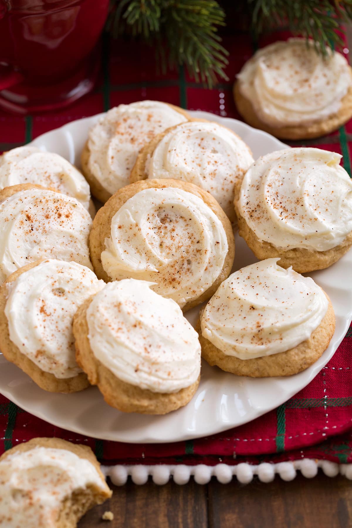 Eggnog Cookies Image of plate full of frosted eggnog cookies.