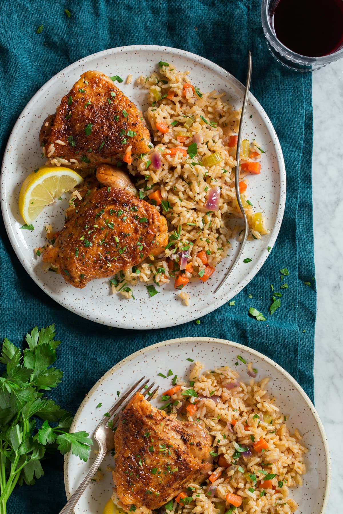 One Pot Chicken and Rice Two plates of chicken and rice.